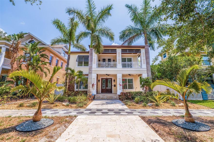 You Can Truly Have It All – Stunning Pool Home in the Heart of Old Northeast! Located just steps from vibrant Downtown St. Petersburg, this meticulously crafted 2017-built home offers the perfect blend of modern luxury and charm. Not only is this home a masterpiece, but it also boasts peace of mind with impact windows and doors—it sustained no damage and didn’t even lose power during the hurricanes. Designed with both comfort and style in mind, this 4-bedroom, 5-bathroom home features an open floor plan perfect for entertaining. The chef’s kitchen is a showstopper, complete with a 6-burner Wolf gas range, Subzero refrigerator, and an expansive 10-foot granite island—ideal for culinary creations or casual gatherings. The space flows seamlessly into three outdoor areas, including two upper covered decks and a lower screened patio, offering the ultimate spot for enjoying Florida’s beautiful weather. The tropical fenced backyard is an entertainer's dream, with a stunning pavered pool deck, heated pool and jacuzzi, creating a serene oasis for relaxation. Inside, a formal dining room with a cozy fireplace sets the stage for memorable family gatherings, while an upstairs bonus/flex space provides endless possibilities to suit your needs. This home is equipped with Control4 smart home technology, allowing you to effortlessly control lighting, climate, and security. Sonos speakers are built into every room for seamless music throughout the house, creating an immersive experience wherever you are. For added convenience, the home features a downstairs laundry room and additional laundry hookups upstairs. Every closet is outfitted with custom closet systems, offering both organization and luxury. Additional upgrades include plantation shutters, 8 foot doors and 10 foot + ceilings further enhancing the home’s charm. For added convenience, the AIR CONDITIONED two-car garage is accessed via an alley, ensuring privacy and ease. This home combines modern luxury with the timeless charm of Old Northeast, just a short stroll from downtown’s vibrant culture, dining, and entertainment. Rest easy knowing that this home is built to withstand the elements, offering both beauty and security. Don’t miss the opportunity to make this dream home yours. Schedule a private showing today! VIDEO--> https://ab3-visuals.aryeo.com/videos/01947528-2b89-716e-800e-f25d75a03308?v=364
