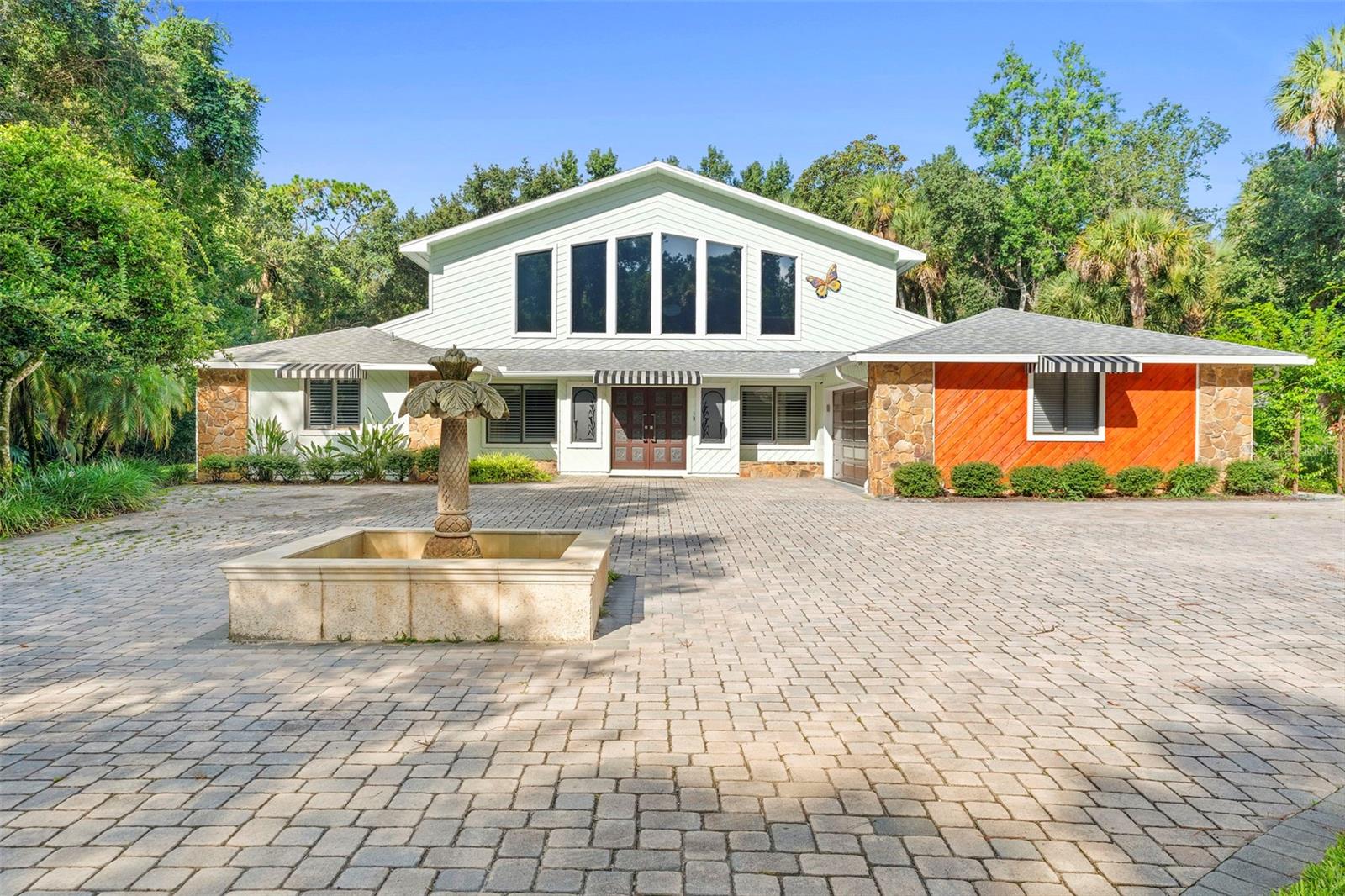 Old Florida charm, nearly 2 acres, and room for everyone.
Set on just under 2 private acres in the heart of New Smyrna Beach, this well maintained 4 bedroom 3 bath pool home delivers the kind of space and setting that’s almost impossible to find anymore. Framed by mature Florida foliage and tucked into a quiet street, it feels like your own private retreat—yet you’re still close to beaches, dining, schools, and everything that makes NSB special.
Step inside to a welcoming main living area that opens to the screened-in pool and patio, perfect for year-round Florida living, weekend cookouts, and memory-making holidays. An open loft upstairs overlooks the living room and kitchen, creating flexible space for a playroom, bunk lounge or office.
With 4 true bedrooms plus an oversized loft you’ve got room for a growing family, long-term guests, or multi-generational living. One guest bathroom has already been updated, while the primary bath has been fully demo’d—and the seller has the new fixtures ready to go. Finish it to your taste, build instant equity, and design the retreat you’ve always wanted.
List of home updates: New Roof 2018, New AC 2018, Pool Heater 2021, Shark Coating garage 2024, Bathroom remodel 2024,
