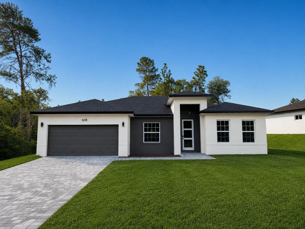 Photo of 6311 SW 153rd Lane, Ocala, FL 34473 (MLS # O6383462)
