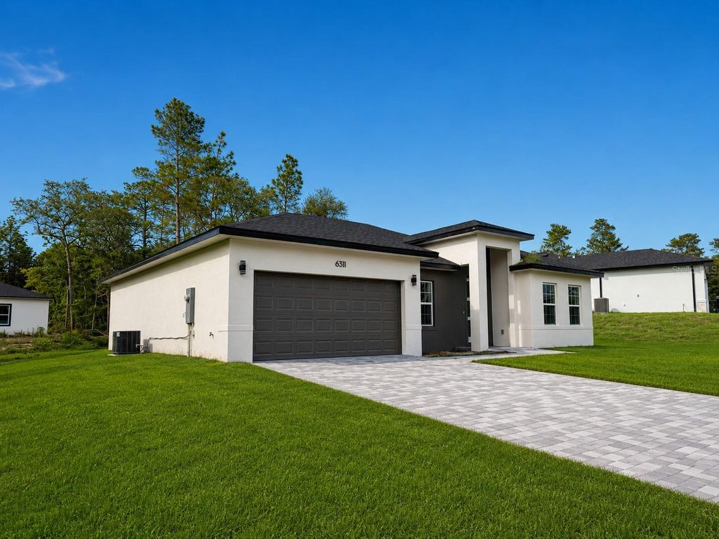 Photo of 6311 SW 153rd Lane, Ocala, FL 34473 (MLS # O6383462)