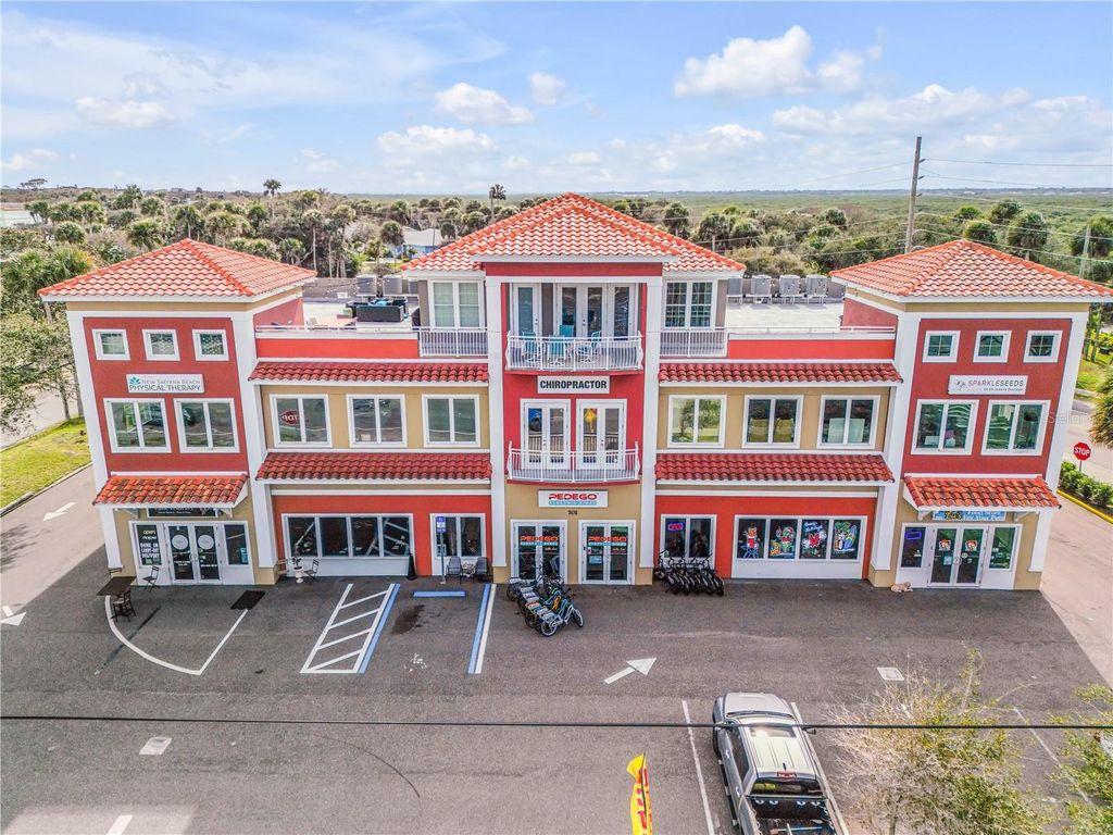 Photo of 701 E 3rd Avenue #4, New Smyrna Beach, FL 32169 (MLS # NS1085366)