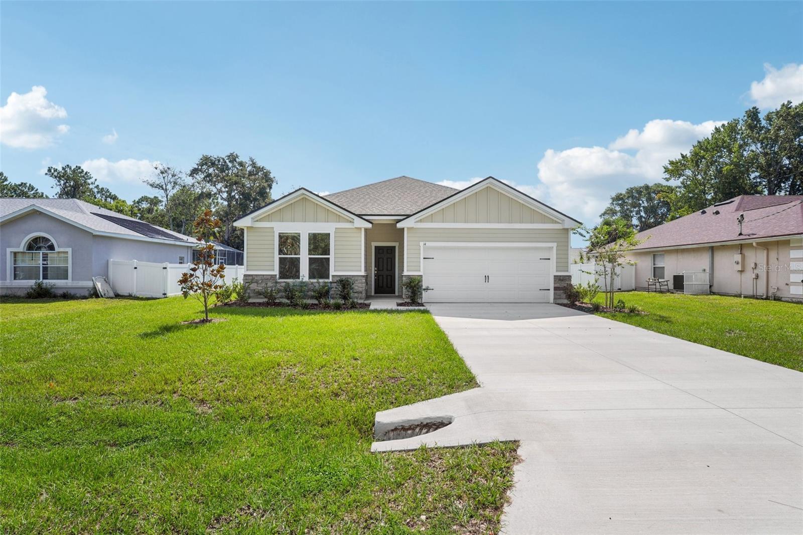 Your new home in Palm Coast, FL awaits! Discover the only new affordable luxury homes in Palm Coast, where you can enjoy the Florida lifestyle in Flagler County with no HOA or CDD fees, just natural beauty and breezy coastal living.
Welcome to 14 Patchogue Pl, Palm Coast, FL, a beautifully upgraded 4-bed, 2-bath single-story residence listed at $314,990, offering tasteful detailing and a serene wooded backyard.
Experience comfort and style with 14 Patchogue Pl, a thoughtfully upgraded four-bedroom, two-bath home nestled in a peaceful wooded setting in Palm Coast. At just under $315K, it offers:
A chef-inspired kitchen with grey shaker-style cabinets, upgraded hardware, and crown molding that elevate the space.
Spacious, open-concept layout ideal for entertaining or cozy family evenings.
A serene, partially fenced backyard bordered by lush trees, perfect for morning coffee, garden plans, or safe play areas.
A home that blends quality, convenience, and quiet enjoyment, all without HOA dues.
Make this home your retreat, and enjoy the best of Northeast Florida living, from beaches to boating, trails to town centers, all just minutes away.