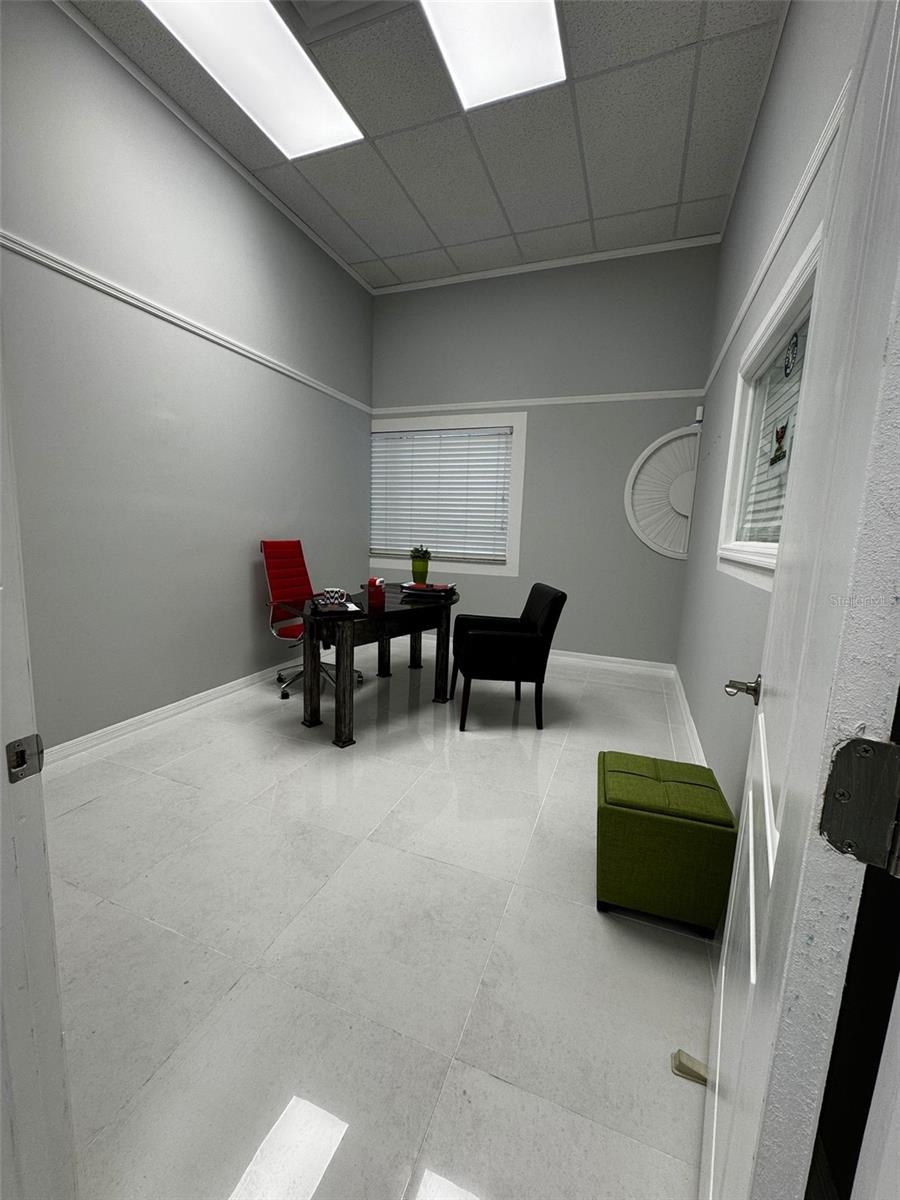 Private office space is available for lease in a modern and professional shared commercial suite. Two private office rooms are available, each offering approximately 140 SqFt of functional workspace. Located approximately 3.5 miles from Universal’s new Epic Universe theme park, this location is ideal for professionals seeking visibility and convenience in a high-growth area.
The lease includes all utilities—electricity, water, high-speed internet—as well as access to a shared meeting room with a projector, kitchen, pantry, and 24/7 building access. Janitorial service and maintenance are also provided. The building offers a clean, elegant, and business-oriented environment, perfect for consultants, attorneys, real estate professionals, and remote workers.
Contact the listing agent for more details or to schedule a showing