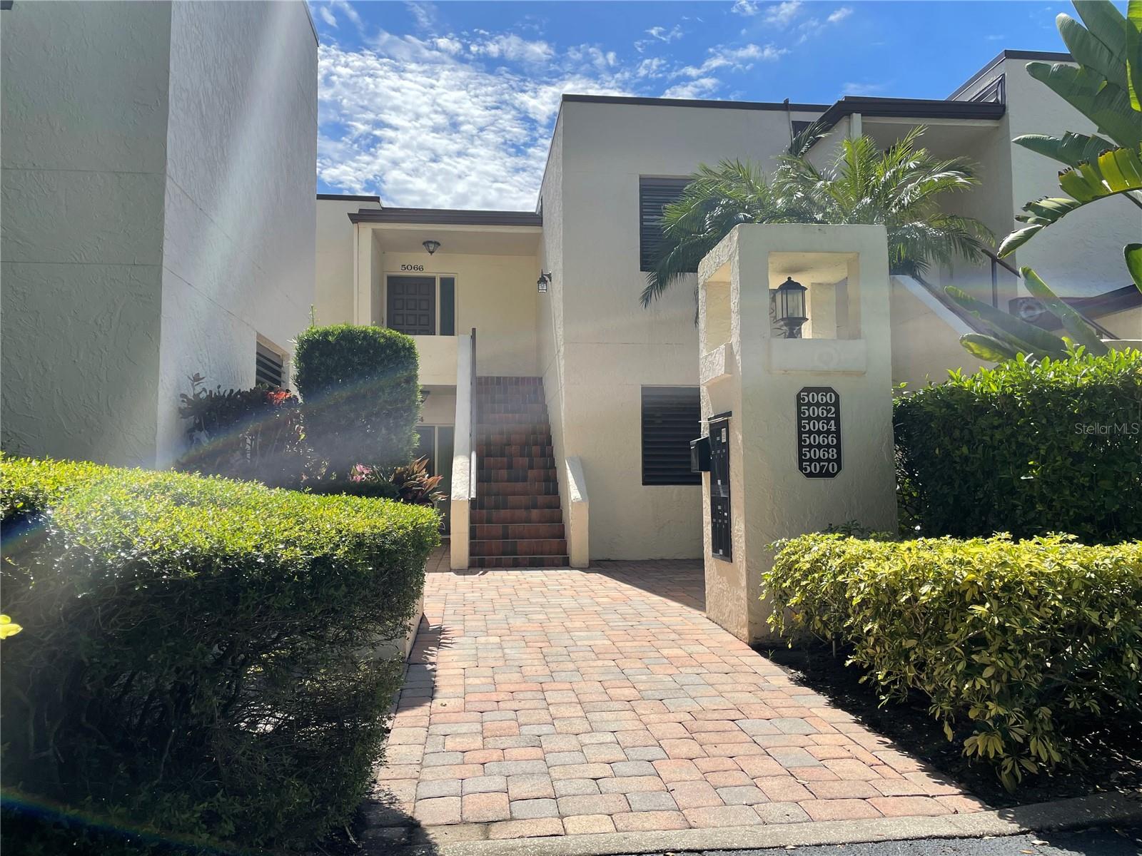 Experience stunning water and golf course views from this first-floor, three-bedroom, two-bathroom condo available for annual unfurnished rental! Freshly updated with NEW paint throughout, this spacious home features oversized tile flooring in the main living areas and primary bedroom, while the two secondary bedrooms have BRAND NEW carpet. The kitchen offers ample cabinetry and counter space, along with stainless steel appliances—perfect for everyday cooking and entertaining. Beyond the kitchen, the large living area provides plenty of space to relax or gather with guests. Sliding doors at the back of the living area open to a covered, screened lanai where you can unwind and enjoy the beautiful views and warm Florida weather. A stackable washer and dryer are included, and a designated parking space right in front adds to the home's convenience. Take advantage of resort-style living with optional amenities including golf, tennis, pickleball, a fitness center, junior Olympic-size pool, and scenic biking and walking trails. Ideally located near a variety of dining options, UTC Mall, Benderson Park, and just 15 minutes from Downtown Sarasota, this rental offers both comfort and convenience. The owner allows one small dog; however, cats are not preferred. Please note that pickup trucks and motorcycles are not permitted per HOA regulations. Contact us today to make this beautiful condo your next home!