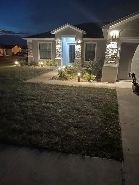 Photo of 215 Chicago Avenue W, Haines City, FL 33844 (MLS # R4911320)