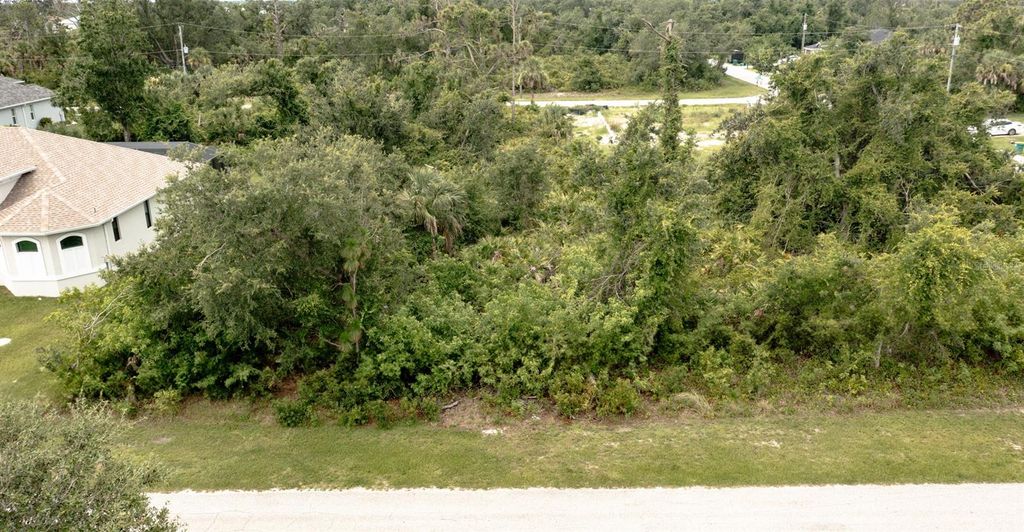 Photo of 13155 Pace Circle, Port Charlotte, FL 33981 (MLS # TB8404112)
