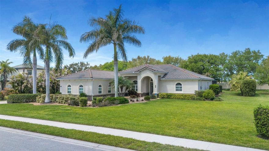 Originally an upgraded builder’s Model Home, conveniently located just inside the premier community of Rye Wilderness , this beautifully appointed 3-bedroom, 3-bath, 3 garage home with a large bonus room sits on a Half-Acre Lot.  Upgrades include an impressive stone accent wall, crown molding, tray ceilings, and quartz countertops throughout. The expansive open floor plan offers easy living and effortless entertaining.  This is the home where everyone wants to gather, with the living room opening to a large lanai, HEATED SALTWATER POOL and SPA, and multiple seating areas.  The split floor plan provides privacy and comfort for the primary suite, which features an en suite bathroom with a garden tub, zero-entry shower, dual sinks, a spacious linen closet, and two John Lewis custom-designed walk-in closets.  On the opposite side of the home, you’ll find two additional bedrooms—each with walk-in closets—two bathrooms, and a large bonus room with sliding glass doors to the lanai, perfect for a home office, den, or game room.  The current homeowners have added significant value, including a NEW WATER HEATER (2021) & LENNOX 5 TON A/C (2021) WITH MEDICAL GRADE FILTRATION, a whole-house water purification system, wooden plantation shutters, whole house gutter system and Smart Sprinkler System. The roof is cement tile, new in 2014. The three-car garage has been upgraded with new door lifts that recess to the ceiling.  These are just some of the features that make this home an exceptional find. Schedule your tour today and pick up the extensive list of all upgrades. With no CDD fees and low HOA fees, this may be the perfect home for you!