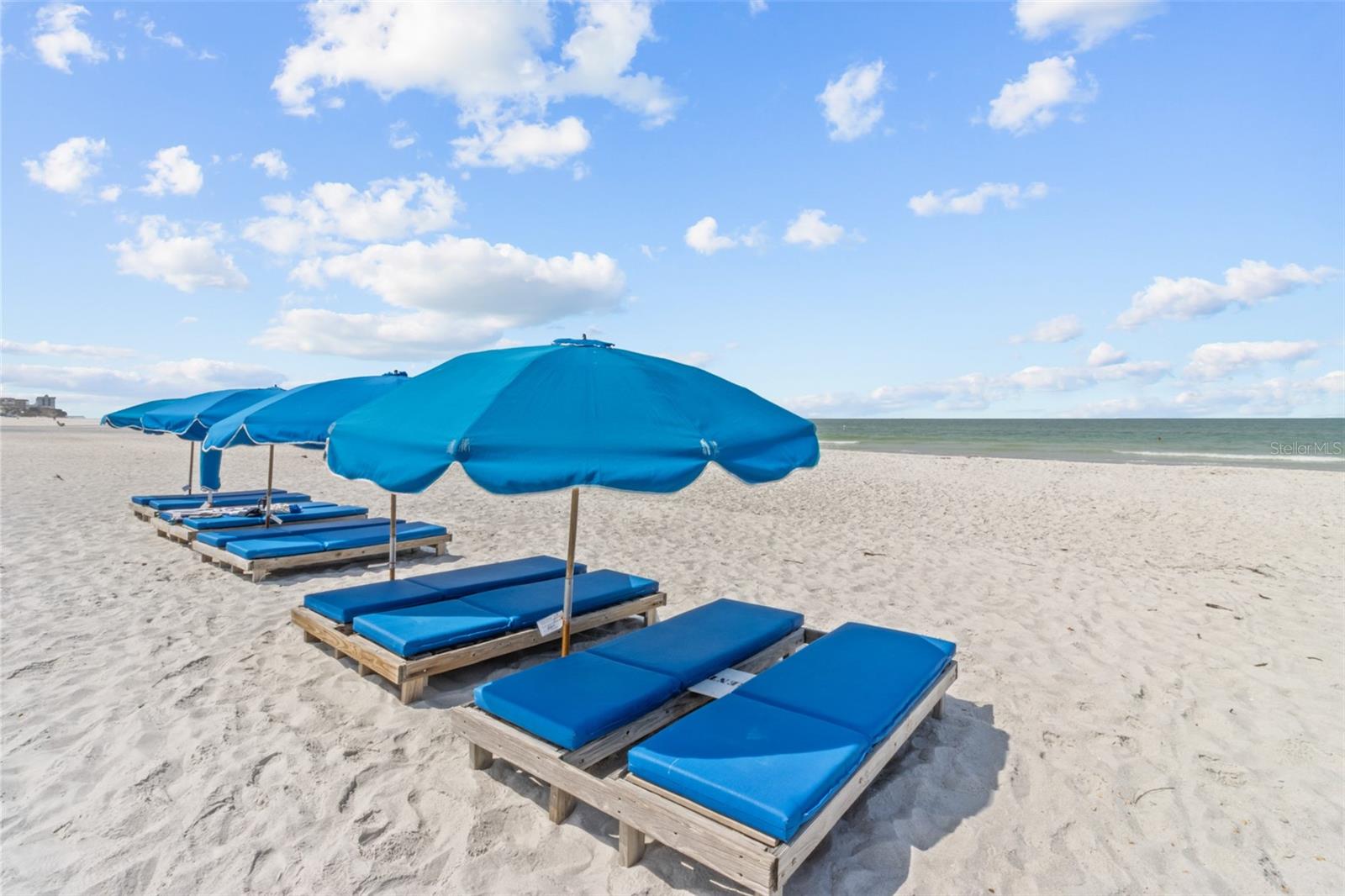 Turnkey Beachfront Luxury with Weekly Rental Income — Indian Shores Gem
Wake up to the sound of waves and end every day with a breathtaking sunset over the Gulf of Mexico. This fully renovated, furnished 2-bedroom, 2-bathroom beachfront condo offers the ultimate blend of modern luxury, rental income potential, and coastal serenity — all in the heart of Indian Shores.
Situated directly on the powdery white sands of the Gulf, this meticulously updated unit invites you to live the dream or cash in on it with high-demand weekly rentals. With forward bookings available and excellent rental income, this is both a smart investment and a stunning retreat.
Step inside to discover contemporary coastal design with wood-look ceramic tile flooring, quartz countertops, soft-close cabinetry, and new stainless steel appliances. The open-concept kitchen, living, and dining area makes entertaining effortless — all set against a backdrop of spectacular Gulf views. A full-size washer and dryer adds convenience, while high-end furnishings complete the turn-key experience.
The primary suite is a peaceful escape featuring slider access to the beachfront balcony, a large walk-in closet, and a spa-like ensuite with double vanities and granite countertops. The spacious guest bedroom and bath are perfect for family, guests, or working remotely — with split-bedroom layout ensuring privacy for all.
Outside, enjoy a resort-style Gulf-front pool and spa, expansive sun deck with plenty of seating, gas grilling area, and direct beach access. The building is milestone complete and has had major updates including a new roof new appliances and more, ensuring peace of mind for years to come.
Additional perks include secure building entry, under-building reserved parking, guest parking, bike racks, kayak storage, and even a car wash area. You'll also love the proximity to Clearwater, St. Pete, and Tampa International Airport — plus nearby shops, dining, and nightlife just minutes away.
Whether you're looking for a personal beachfront escape or a high-performing investment, this condo checks every box. Sold furnished and turn-key—step in and start living (or renting!) the beach life today.
Don’t miss this rare opportunity to own beachfront luxury with proven income in a prime location. Schedule your private showing now! Perfect for first time investors, families wanting a beach retreat, as well as 1031 exchange buyers.