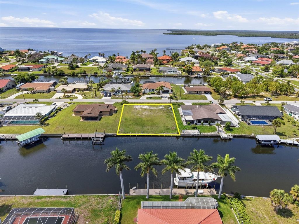 Photo of 108 Sinclair Street SE, Port Charlotte, FL 33952 (MLS # C7524882)