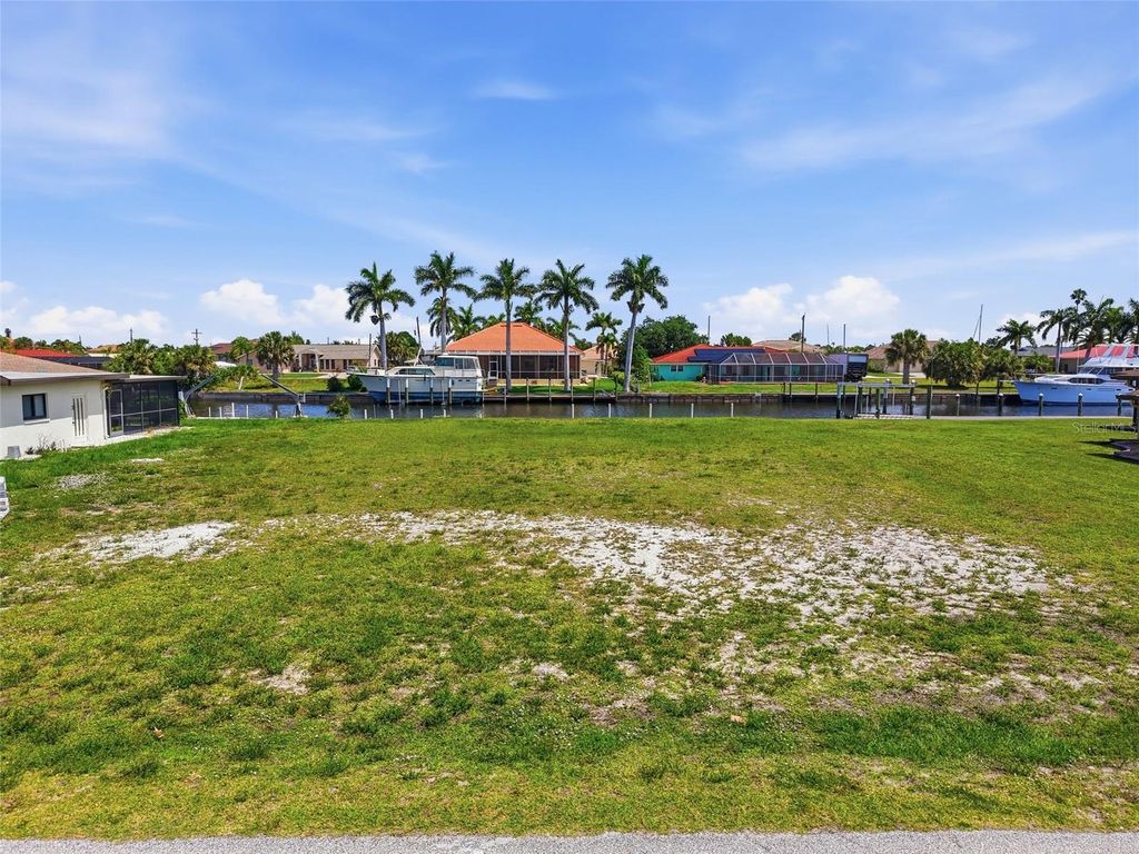 Photo of 108 Sinclair Street SE, Port Charlotte, FL 33952 (MLS # C7524882)