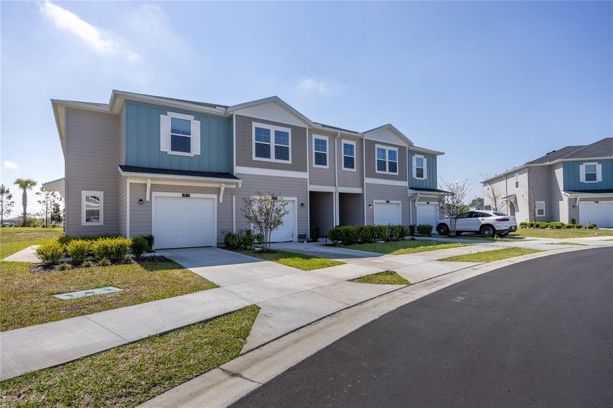 Welcome to this beautifully designed 3-bedroom 2.5-bath townhouse in the highly desirable community of Marion Ranch. This newly constructed home (2025) features a spacious open-concept layout, ideal for both everyday living and entertaining. The kitchen truly is the heart of your home, boasting stylish cabinetry, quartz countertops, stainless steel appliances, abundant counter space, and a functional design that flows effortlessly into the cozy living and dining areas. You'll also find on the first floor an attached one-car garage, a half bathroom, and a covered lanai. On the second level, you'll find three generously sized bedrooms, 2 bathrooms, a loft, and a laundry room with a new washer and dryer. The spacious primary bedroom suite features double doors, a private bathroom with a dual-sink vanity, a walk-in shower, and a generous walk-in closet. Between bedrooms two and three is a jack-and-jill bathroom. This end unit has one of the largest floor plans, and the interior has been recently repainted, along with high-end fans and lighting. Experience low-maintenance living with hassle-free HOA-covered lawn care and internet, allowing you more time to relax and enjoy everything the Marion Ranch community has to offer! Marion Ranch truly epitomizes a resort-style lifestyle, boasting amenities such as a brand-new clubhouse, a fully equipped fitness center, a stunning pool, tennis courts, pickleball courts, scenic walking trails, and a dog park. Plus, with shopping, dining, and major highways right nearby for added convenience. Don't miss your chance to be part of one of Ocala's most exciting communities—schedule your showing today!