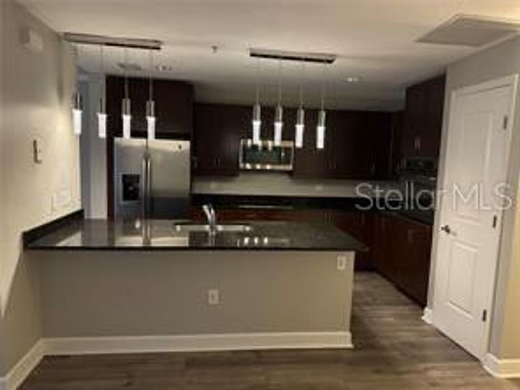 Photo of 100 S Eola Drive #608, Orlando, FL 32801 (MLS # O6396379)