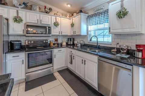 Tiny photo for 15143 SW 14th Avenue Road, Ocala, FL 34473 (MLS # OM724817)