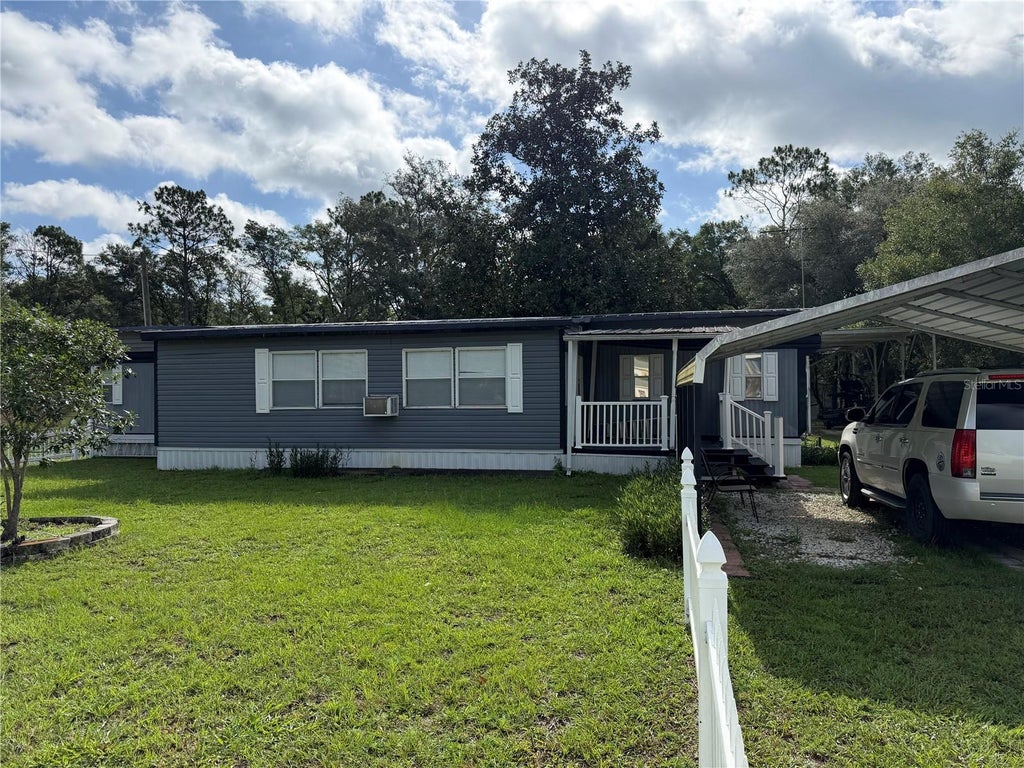 Photo of 111 SW 158th Terrace, Ocala, FL 34481 (MLS # OM728881)