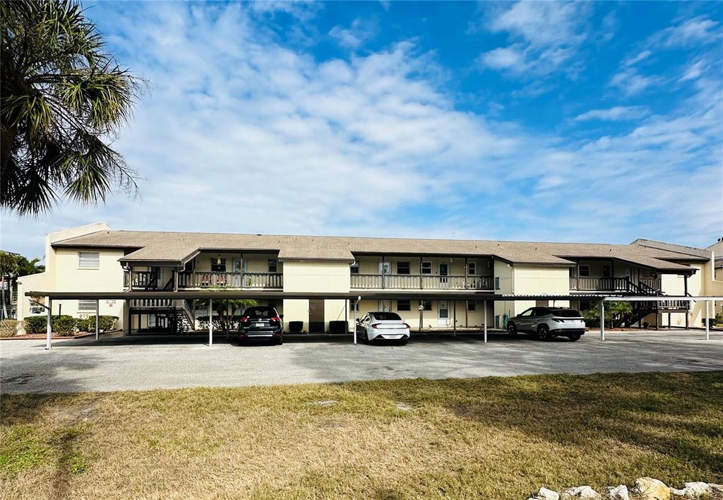 Photo of 4515 Marine Parkway #102, New Port Richey, FL 34652 (MLS # W7871525)