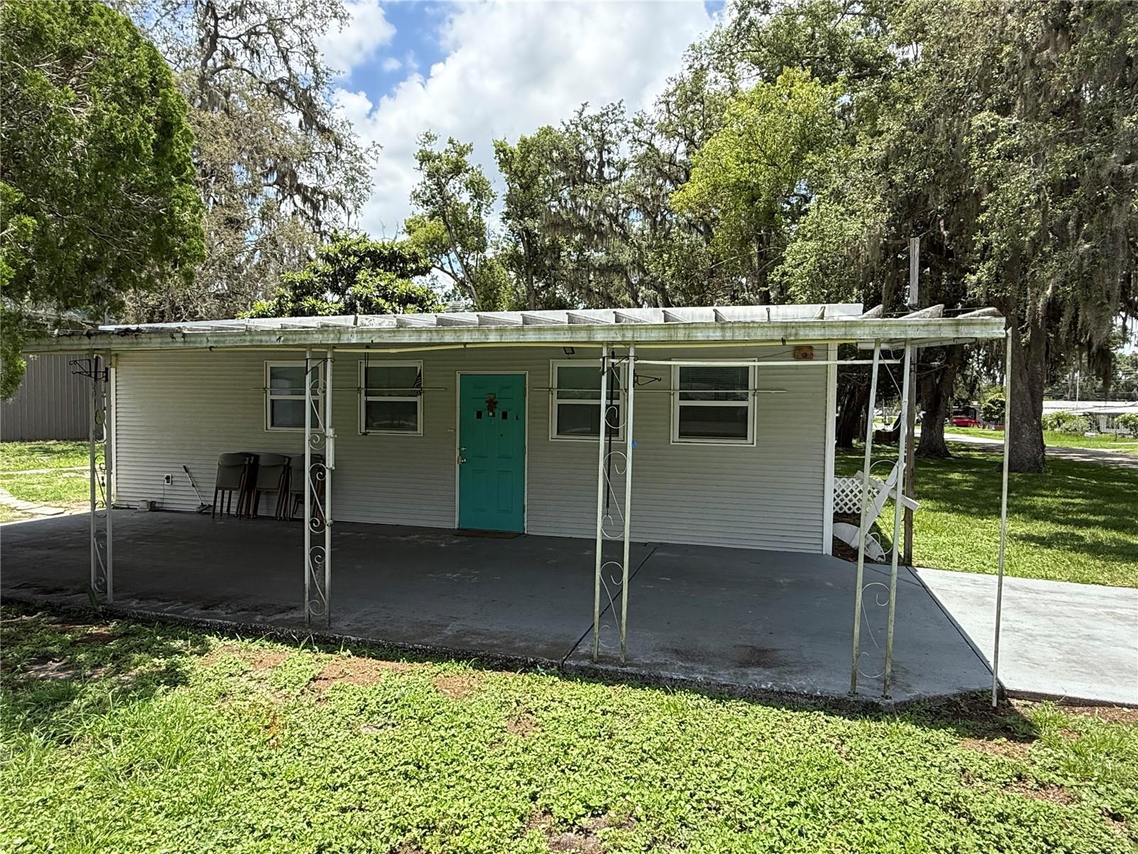 Cozy and quaint, I'm sure you'll agree. This 1 BDR 1 Bath located in beautiful Zephyrhills Fl. on almost a half-acre gives you that warm country feel but is located near the main roads of Zephyrhills for quick access to dining, theater, bowling, hospital, shopping, churches and more. Great opportunity for the investor, winter home or your forever home with No HOA. room measurements are an estimate. Schedule your exclusive tour today.