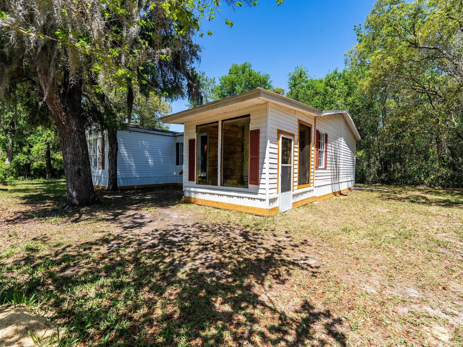 $5,000 Seller Credit to Buyer for Accepted Contract prior to September 30, 2025.
Fully Renovated 3BR/2BA Home on 0.41 Acre lot – Across from Ocala National Forest
Looking for peace, privacy, and modern upgrades? This move-in-ready 3-bedroom, 2-bathroom home sits on a quiet
dead-end road across from Ocala National Forest and OHV trails – perfect for nature lovers, off-roaders, and weekend
adventurers, or your family!
2,108 sq ft with flexible living spaces (plus bonus screened-in room and shed)
Professional roof replacement done in 2024
New HVAC & ductwork (2020 & 2023)
Brand new kitchen (2025) with soft-close cabinets (18 drawers) and stainless appliances
New plumbing, flooring, outlets, switches, fixtures – inside & out
No HOA, oversized lot (200’ x 90’) that is very private
High-speed internet (over 200mb speed through Kinetic Internet), deep well (100+ feet),
and updated skirting
Enjoy a large great room with cozy fireplace and custom feature wall. The home also includes a large second living room space, eat-in
kitchen plus island bar AND breakfast bar that adjoins the living and dining rooms. A large pantry and laundry room are off the large kitchen.
Also includes a storage shed, 150 sq ft screened-in porch (not included in square footage), oversized primary suite with his/hers walk-in
closets, garden tub and separate large shower, plus large guest rooms and bonus spaces for family, hobbies, or work-from-home setups.
Minutes from boat ramps, springs, camping and OHV trails; Fort McCoy (15 min), Silver Springs (25 min), Ocala (30 min), Gainesville (50 min)
Ideal for full-time living or a weekend escape. Turnkey and priced to sell! Schedule your tour today.