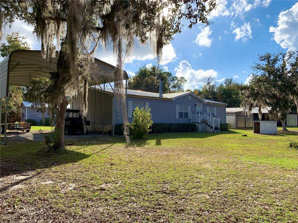 Photo of 17630 NE 246th Place, Fort Mccoy, FL 32134 (MLS # TB8539745)