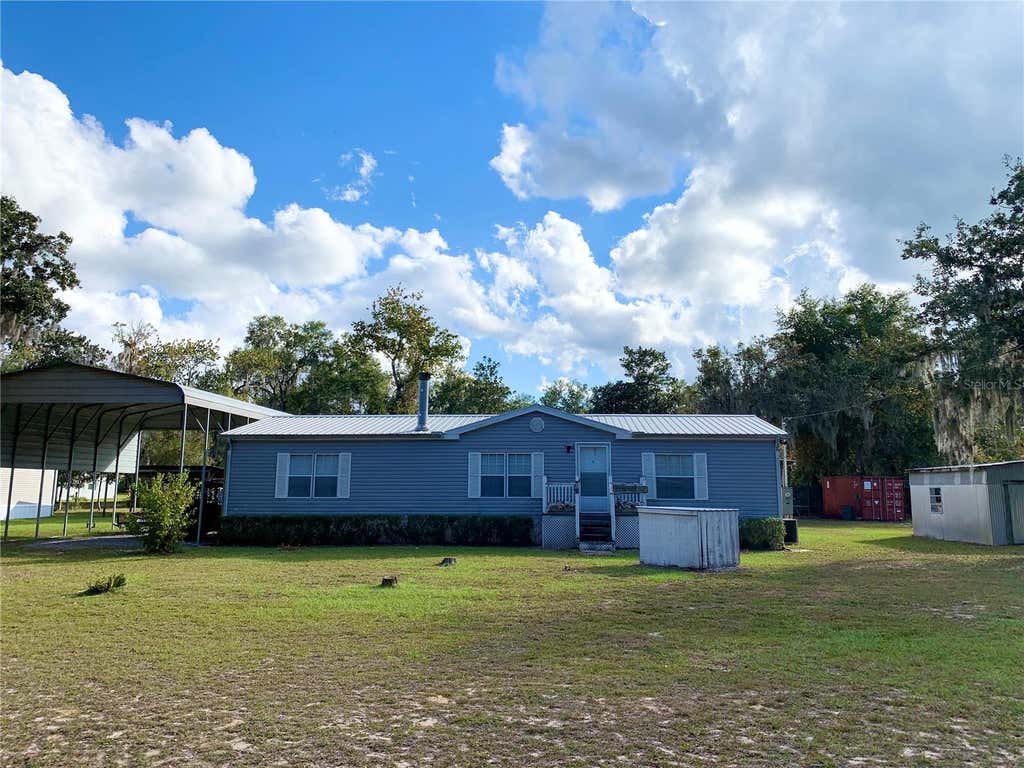 Photo of 17630 NE 246th Place, Fort Mccoy, FL 32134 (MLS # TB8539745)