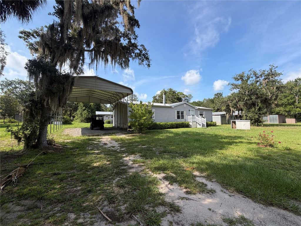Photo of 17630 NE 246th Place, Fort Mccoy, FL 32134 (MLS # TB8539745)