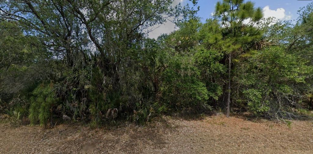 Photo of 377 Juper Street, Port Charlotte, FL 33953 (MLS # O6356571)