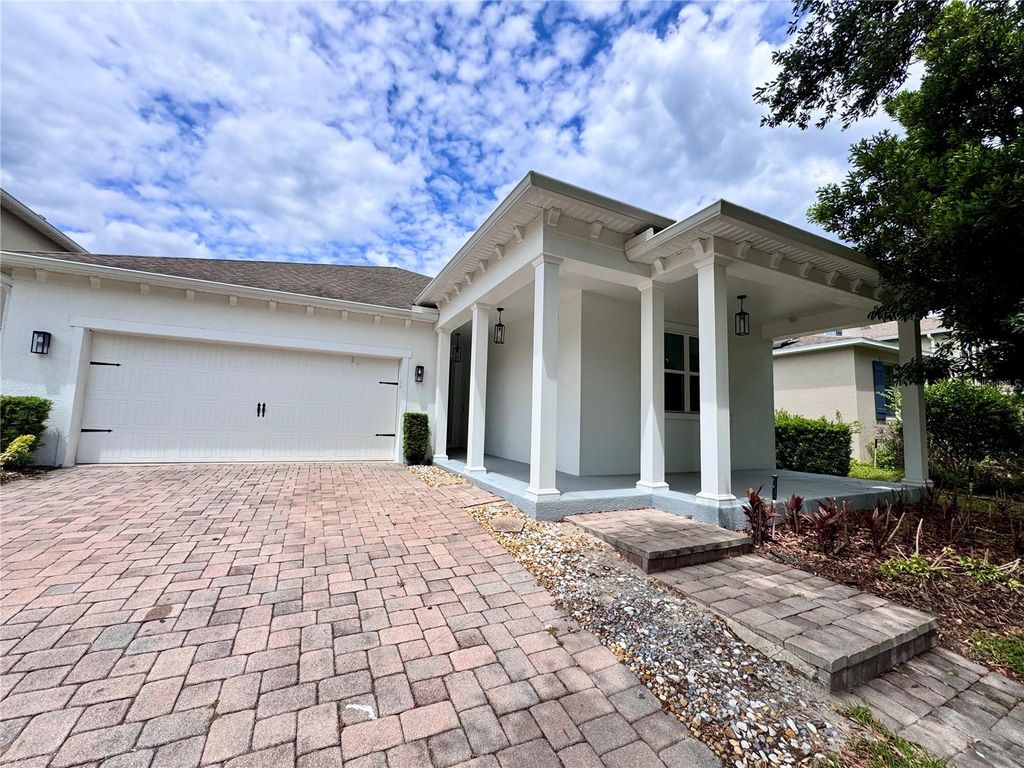 Photo of 11860 Thatcher Avenue, Orlando, FL 32836 (MLS # O6401580)