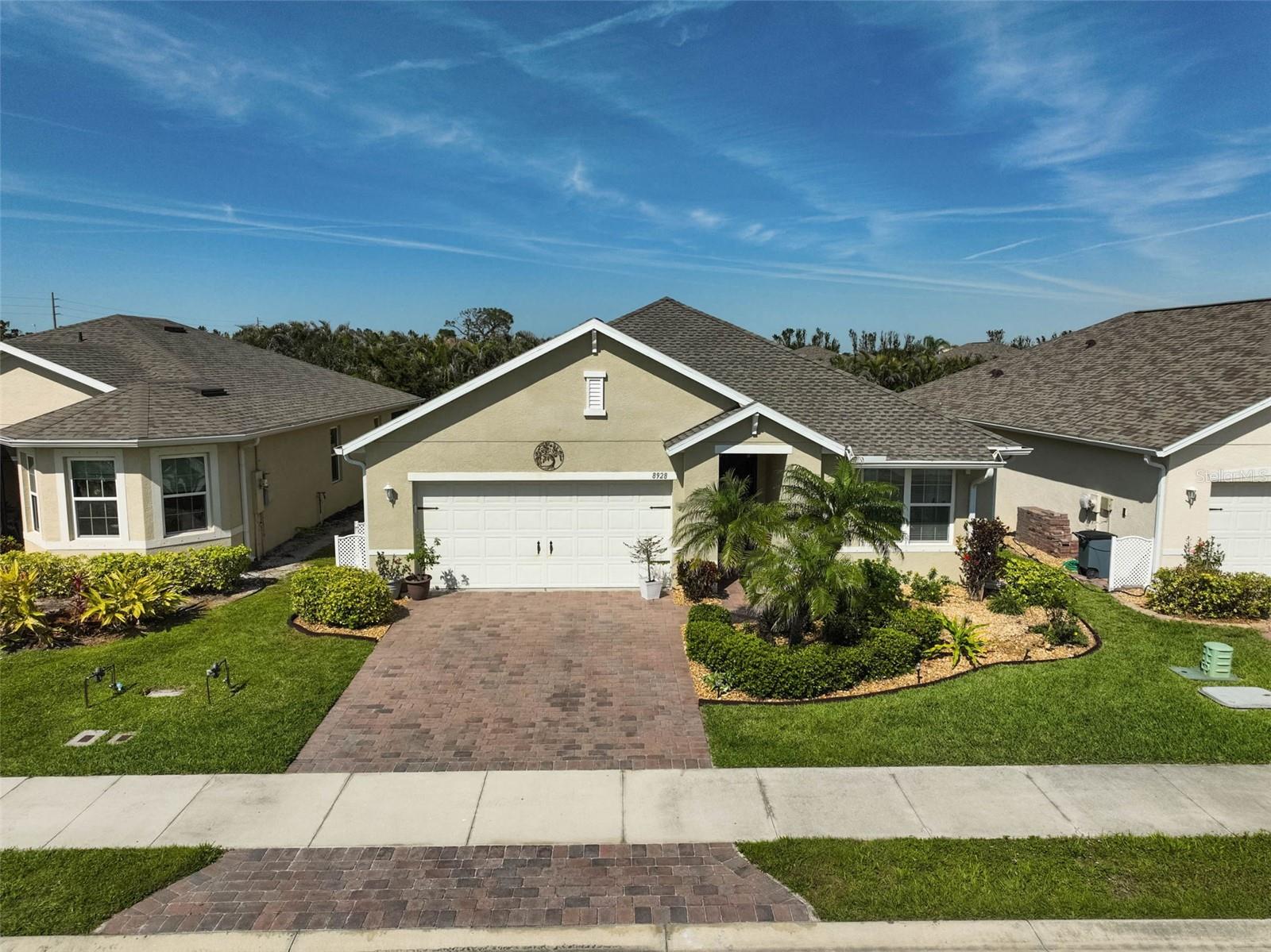 Discover Your Dream Home with Modern Elegance and Ample Space! Welcome to Rapalo, a stunning residence that combines immaculate tile flooring with a bright, open living area designed for both relaxation and entertaining. With a brand new roof installed in November 2024, you can move in with peace of mind! Imagine gathering with friends around the expansive kitchen island, surrounded by luxurious granite countertops, a stylish updated backsplash, and a sleek microwave that elevate the heart of your home. The thoughtfully designed split floor plan ensures your privacy, with the Primary Suite artfully separated from the other bedrooms. Here, you’ll find a tranquil sanctuary complete with a private ensuite, allowing you to wake up feeling rejuvenated every day. Each room in this meticulously maintained home boasts modern finishes, ready for you to personalize. Need a dedicated workspace? The office/flex room is the perfect solution for your remote work needs. Step outside to a spacious backyard and unwind in the screened-in lanai, a fantastic space for relaxation or entertaining guests. Enjoy the perks of a vibrant community, just steps away from a refreshing pool — your ideal spot for cool dips and social gatherings. Plus, with no CDD fees, you can fully enjoy the benefits of this wonderful neighborhood without any additional costs! This home combines style, comfort, and privacy in a beautifully maintained setting. Located just minutes from shopping, dining, and a short 10-minute trip to breathtaking beaches, it truly offers the best of everything. Don’t miss out—schedule your showing today and find out why this home could be the perfect match for you!