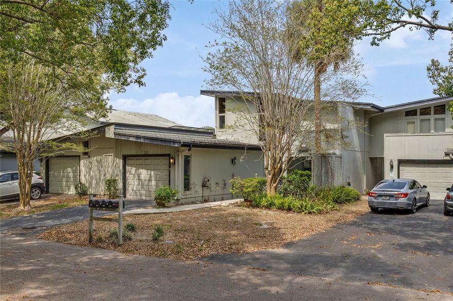 One or more photo(s) has been virtually staged. Located in the highly sought-after Lake Francis Village within Errol Estate in Apopka, this distinctive residence offers the perfect balance of privacy, character, and convenience. Enjoy easy access to shopping, dining, and major thoroughfares including SR 429 and 414, placing Central Florida’s top destinations just minutes away. The property is also zoned for A- and B-rated schools, adding to its overall appeal. Nestled along a mature, tree-lined street, Lake Francis Village is known for its unique collection of mid-century modern homes, each thoughtfully designed with its own architectural personality; creating a neighborhood unlike any other. This mid-century modern home showcases striking design elements, including expansive floor-to-ceiling windows with views of Lake Francis, a private courtyard-style entrance, two balconies, and a rear wood deck; perfect for enjoying Florida’s indoor-outdoor lifestyle. Recent updates include vinyl flooring throughout the first floor, laminate flooring on the second floor, a 2024 HVAC system, and a 2024 water heater. The first floor features a spacious living room filled with natural light, a formal dining room, and an additional dining area within the kitchen. A stylish floating staircase serves as a centerpiece, while a dedicated laundry room adds convenience. Upstairs, you’ll find two generously sized bedrooms; each with vaulted ceilings and private balconies overlooking the front and rear—along with two full bathrooms and a dedicated storage room. Completing the property is a detached one-car garage. A rare opportunity to own a truly unique home in one of Apopka’s most sought-after communities.