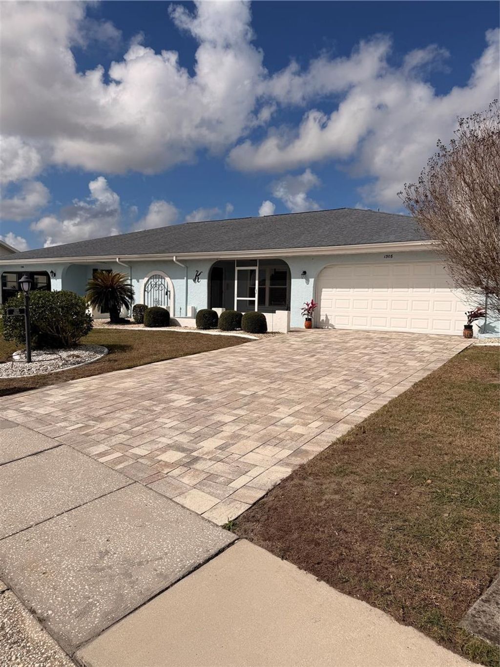 Photo of 1308 Bluewater Drive, Sun City Center, FL 33573 (MLS # TB8451691)