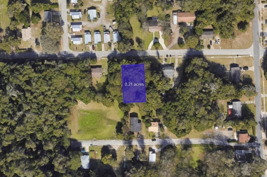 Discover the perfect location for your dream home on this 0.21-acre lot! Zoned for single-family construction, this parcel offers the ideal setting to build your custom residence. Enjoy peace of mind with no wetlands or flood zone concerns, and take advantage of the convenience of public sewer and water services. Nestled near the bustling Hubbard Avenue, this prime lot provides easy access to nearby locations. You'll find a Walmart and schools just a short distance away, making daily errands and school runs a breeze. Plus, there are no HOA fees to worry about! Additionally, there are nearby green spaces where you can enjoy quality time with family and friends in the great outdoors. Don't miss this fantastic opportunity to create the home you've always wanted in a convenient and desirable location.