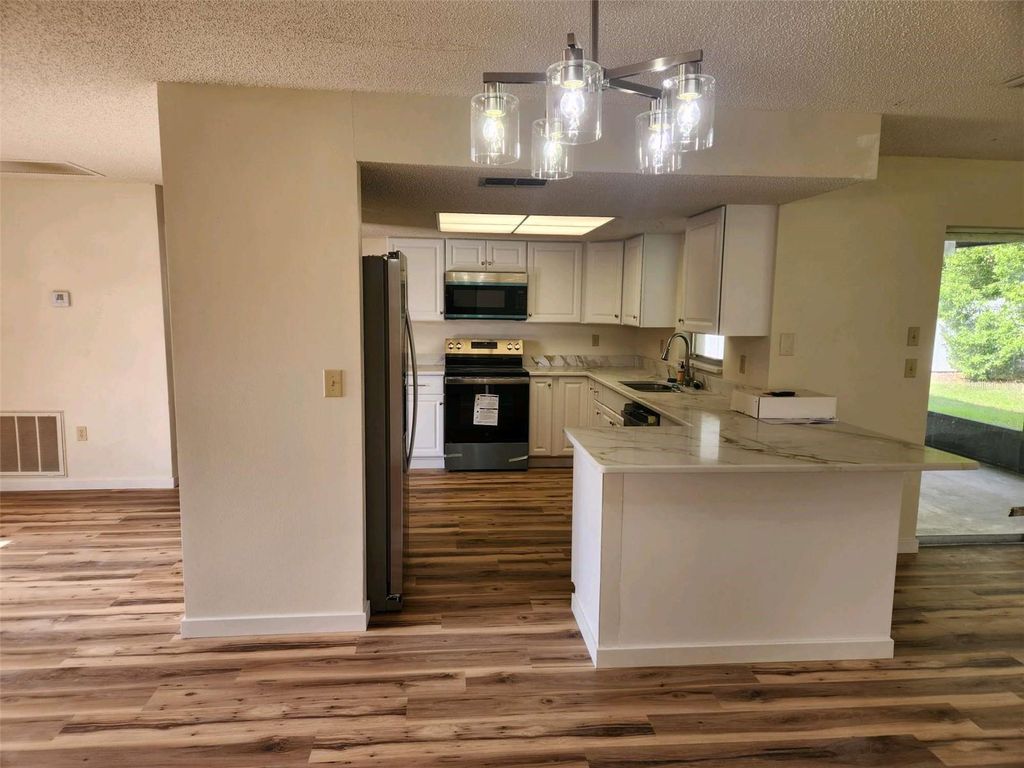 Photo of 14137 Prospect Street, Spring Hill, FL 34609 (MLS # TB8465849)