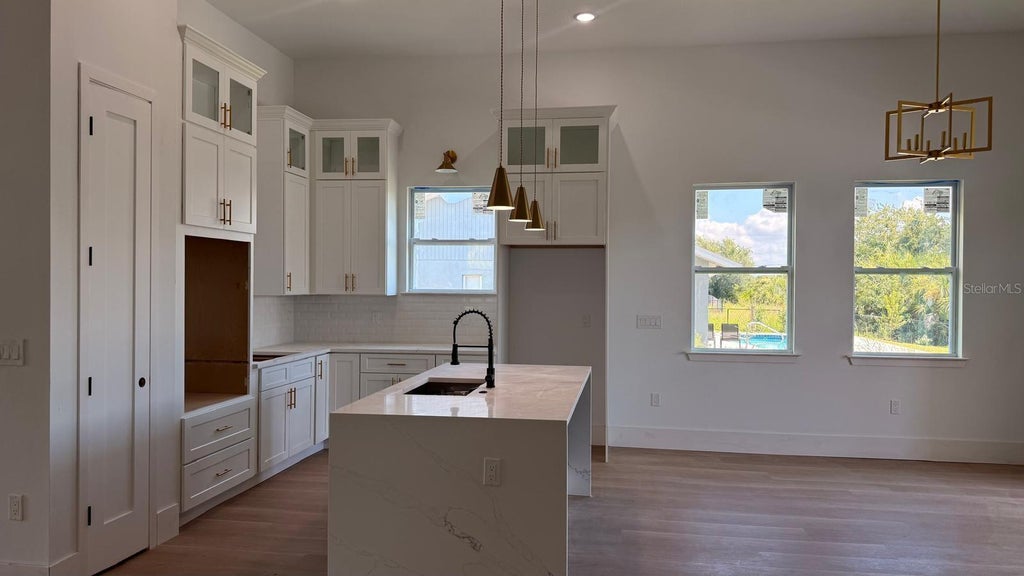 Photo of 14962 Appleton Boulevard, Port Charlotte, FL 33981 (MLS # O6434106)