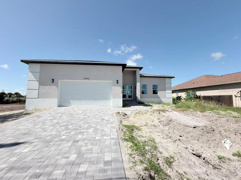Photo of 14962 Appleton Boulevard, Port Charlotte, FL 33981 (MLS # O6434106)