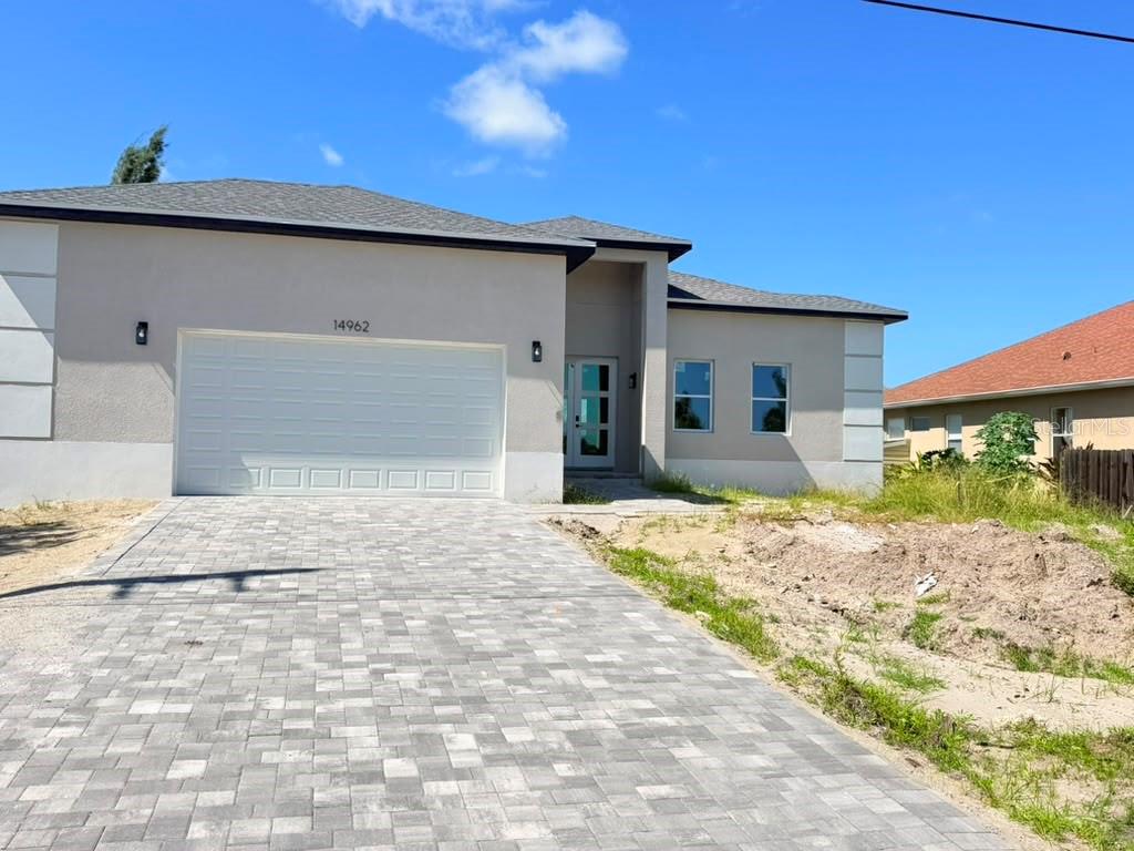 Photo of 14962 Appleton Boulevard, Port Charlotte, FL 33981 (MLS # O6434106)