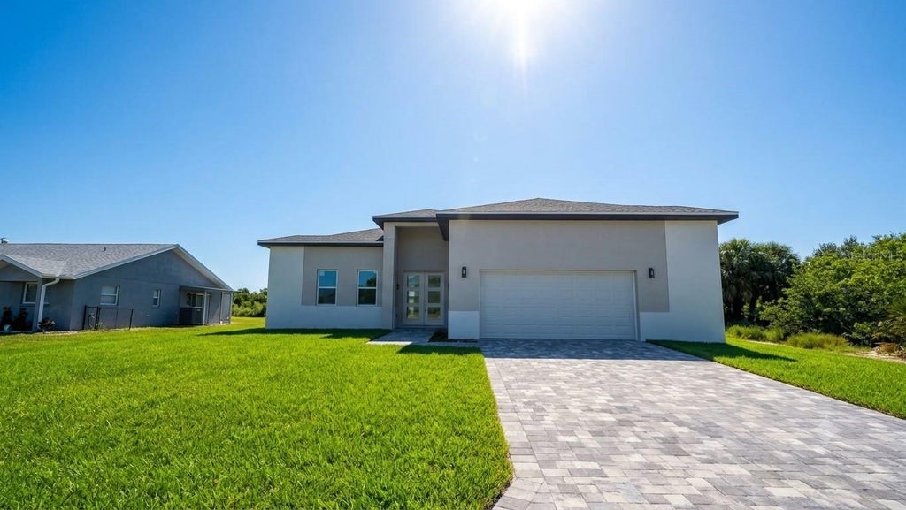Photo of 14962 Appleton Boulevard, Port Charlotte, FL 33981 (MLS # O6434106)