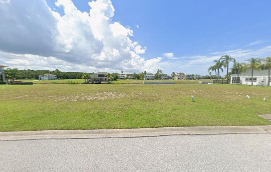 Beautiful Waterfront Lot in the Desirable Upscale community of Hernando Beach South, SEAWALL is already in place! Build your dream home here! Keep your boat at your back door and enjoy beautiful sunsets from the comfort of your back porch!