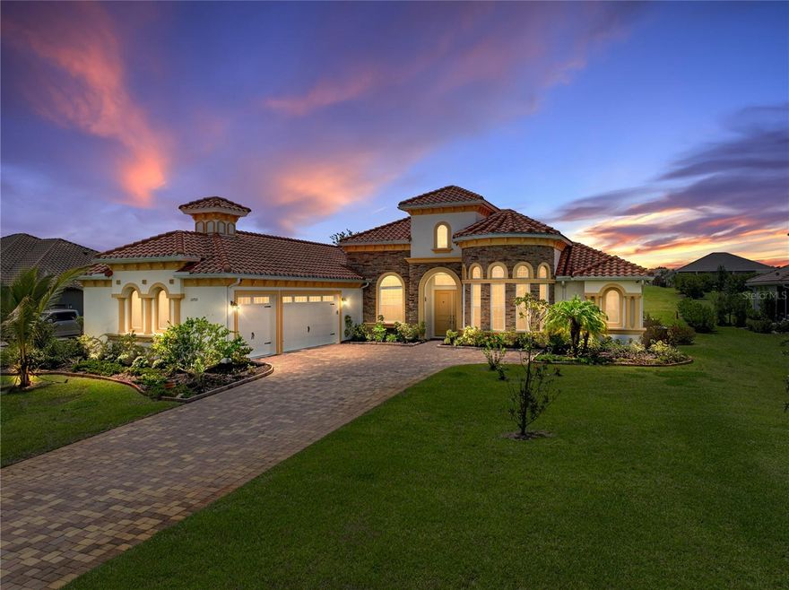 Discover this breathtaking, custom-designed 2022-built residence, offering 3,440 sq. ft. of luxurious living on nearly 0.67acres. This home is one of the kind in entire community.Designed for elegance, comfort, and seamless indoor-outdoor entertaining, the home features crystal chandeliers in the foyer, formal dining room, and kitchen, 8-ft doors throughout, ceramic tile floors, and soaring ceilings.
Pavered driveway leads to a grand double-door entry and 13-ft covered foyer with concrete roof tiles.This home is filled with natural light, creating an open and airy atmosphere throughout. Large windows invite abundant sunlight, making every room warm and welcoming. The formal room and family rooms feature 12-ft ceilings, creating an extraordinary sense of space. The gourmet kitchen offers high-end finishes, upgraded granite countertops, ample storage, an instant hot water and drinking water filtration system, full-size appliances, a small freezer, and a 250-gallon underground propane tank for gas cooking.
The primary suite provides privacy and luxury with two walk-in closets and a spa-like en-suite bath featuring a rain shower and jets. Guest bedrooms include a Jack & Jill bath, while a versatile third bedroom/game room offers additional entertainment space. A private Office is counted as 5th bedroom is filled with sunlight with 8-ft French doors. The home includes a well-appointed laundry room, pantry, half bath for guests, and additional water softener system.
Step outside to a resort-style backyard, An oasis for family fun, gatherings, or peaceful afternoons with heated/ saltwater pool controlled by jades system with 2 variables speed pump , 8-jet hot spa, bubblers, LED color-changing lights, three fountains controlled via mobile app, sun shelf, swim-out bench, umbrella sleeves, and dedicated vacuum line. 
The covered lanai, finished in travertine, features motorized shades, a Soleic designed outdoor kitchen with gas burner, grill, side wash basin, and custom granite countertops, plus provision for a fire pit and seating.Landscaping includes seasonal fruit trees, manicured grounds, and extensive LED outdoor lighting.
Additional features include 9 security cameras hard wire connect that has Wi-Fi capability, Guardian security system, fully paid solar system has consumption offset size 15.795kw DC.Level 2 EV charger & extra shelving in the garage, HOA-provided 1GB fiber optic internet service, and well water full sprinkler system with rust-prevention tank. Lake Jovita offers two award-winning 18-hole golf courses and top-tier practice facilities. Located just 20 minutes from North Tampa and about an hour from Orlando, this home delivers the ultimate Florida lifestyle.
Wake up to manicured fairway views and entertain on the lanai at sunset this extraordinary home is ready to welcome you. Schedule your private tour today.