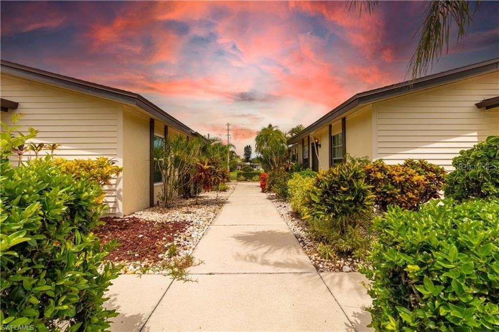 Photo of 1014 Pine Isle Lane #1014, Naples, FL 34112 (MLS # TB8477470)