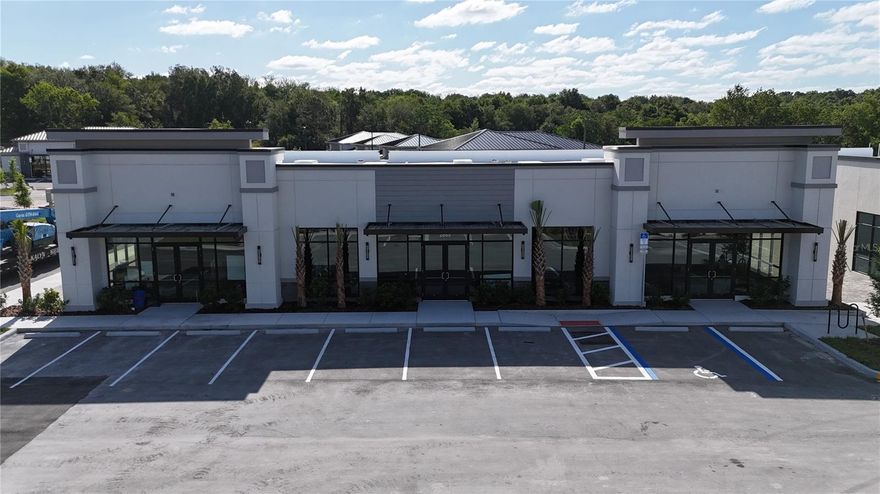Under Construction. Building #03 is available for purchase at Lake Carter Exchange, a distinguished mixed-use development in Apopka’s East Shore at the intersection of Ocoee-Apopka Road and W Keene Road. This dark gray shell retail building features a customizable interior, shared patio space and end-unit dedicated patio space. The shell delivery provides buyers with maximum flexibility to design the interior layout, with three front entrances supporting up to three unique suites. The development is strategically located less than one mile from Advent Health’s seven-story, 120-bed hospital and opposite a new Publix Supermarket development. Situated in the vibrant East Shore trade area, which includes 5,000 planned residences and an average household income above $100k, this Class A property is perfectly positioned for businesses targeting growth in Central Florida’s second-fastest-growing city. Contact us for pricing details/incentives and to schedule a tour of this exceptional commercial opportunity.