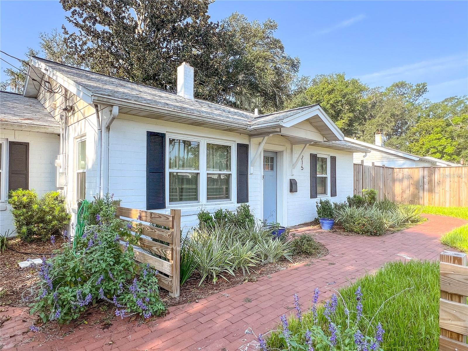 Full renovated vintage charmer in the heart of downtown Gainesville! This expansive 4 bedroom 2 bath home has over 2300 SF. An open and bright flowing floor plan, you walk into a modern kitchen with stainless steel appliances with an eat in breakfast bar that over looks a sun room that looks out over an amazing back yard. The bedrooms are all well sized with a ton of storage! Both bathrooms are fully updated. This home has too many unique features to list! 3 pets welcome. Grad students welcome. Lawn service included!