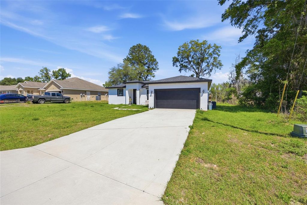 Photo of 4411 SW 132nd Place, Ocala, FL 34473 (MLS # OM722645)