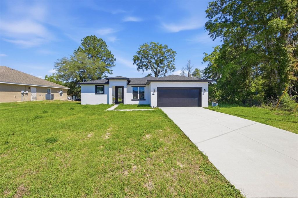 Photo of 4411 SW 132nd Place, Ocala, FL 34473 (MLS # OM722645)