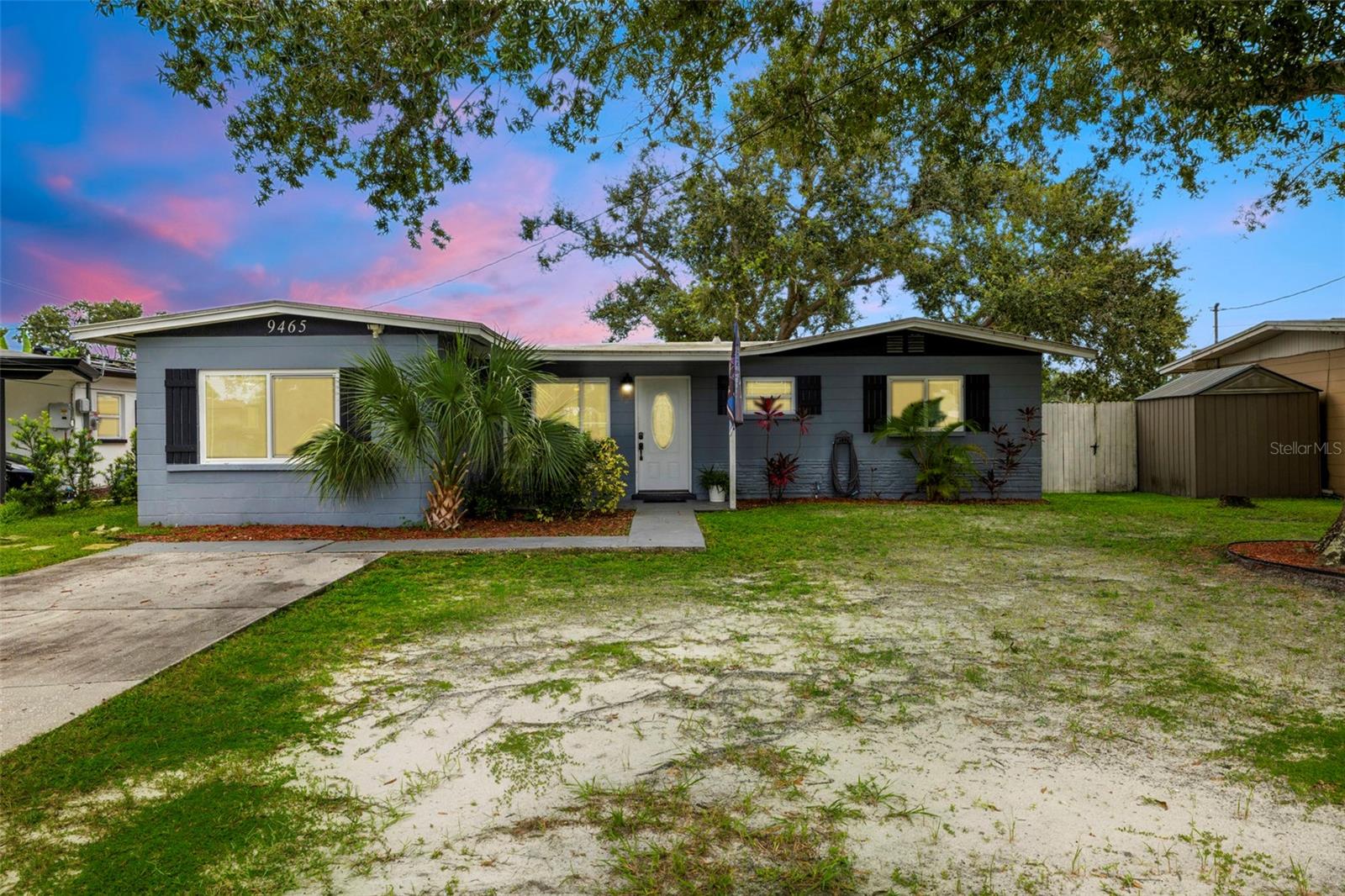 Welcome to 9465 50th Way N in Pinellas Park, where modern updates meet peaceful lakefront living. This 4-bedroom, 2-bathroom home has been thoughtfully improved over the past few years, giving you a worry-free lifestyle with all the big-ticket items already taken care of. A BRAND NEW roof was installed in 2022, new A/C system in 2024, new hurricane-rated windows, new attic insulation just completed in 2025, and a full set of 2022 appliances, bringing both comfort and efficiency to your everyday living. Inside, the home offers a bright and functional layout with flexible space for any lifestyle. The back of the house features a unique connected suite: one room with a standard closet opens to another with a walk-in closet, creating the perfect retreat for a primary suite or a combination bedroom and home office. The additional bedrooms and bathrooms are equally inviting, giving everyone their own space while keeping the flow of the home connected. What truly sets this property apart is its outdoor living. Step onto the large elevated back porch and take in the expansive view of the sparkling lake, whether you’re enjoying your morning coffee, hosting weekend barbecues, or simply relaxing at the end of the day, it’s a space designed for making memories. The fenced backyard stretches all the way to the water’s edge, offering both privacy and plenty of room for pets, gardening, or outdoor play, all framed by the tranquility of the lake. Located in a convenient Pinellas Park neighborhood, you’ll be just minutes from shopping, dining, parks, and major highways, with quick access to downtown St. Petersburg and the Gulf beaches. This home combines the peace of waterfront living with the practicality of modern updates, making it move-in ready and easy to love. Don’t miss the opportunity to call this one yours, schedule your private showing today!