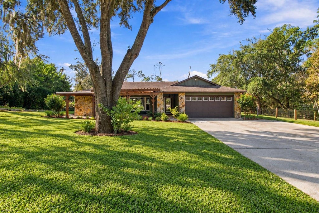 Photo of 7891 Sycamore Drive, New Port Richey, FL 34654 (MLS # W7889901)