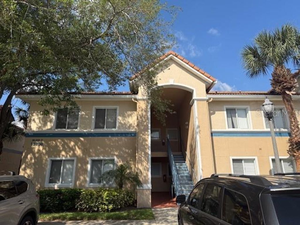 Photo of 13208 Villa Vista Drive #201, Orlando, FL 32824 (MLS # S5146552)