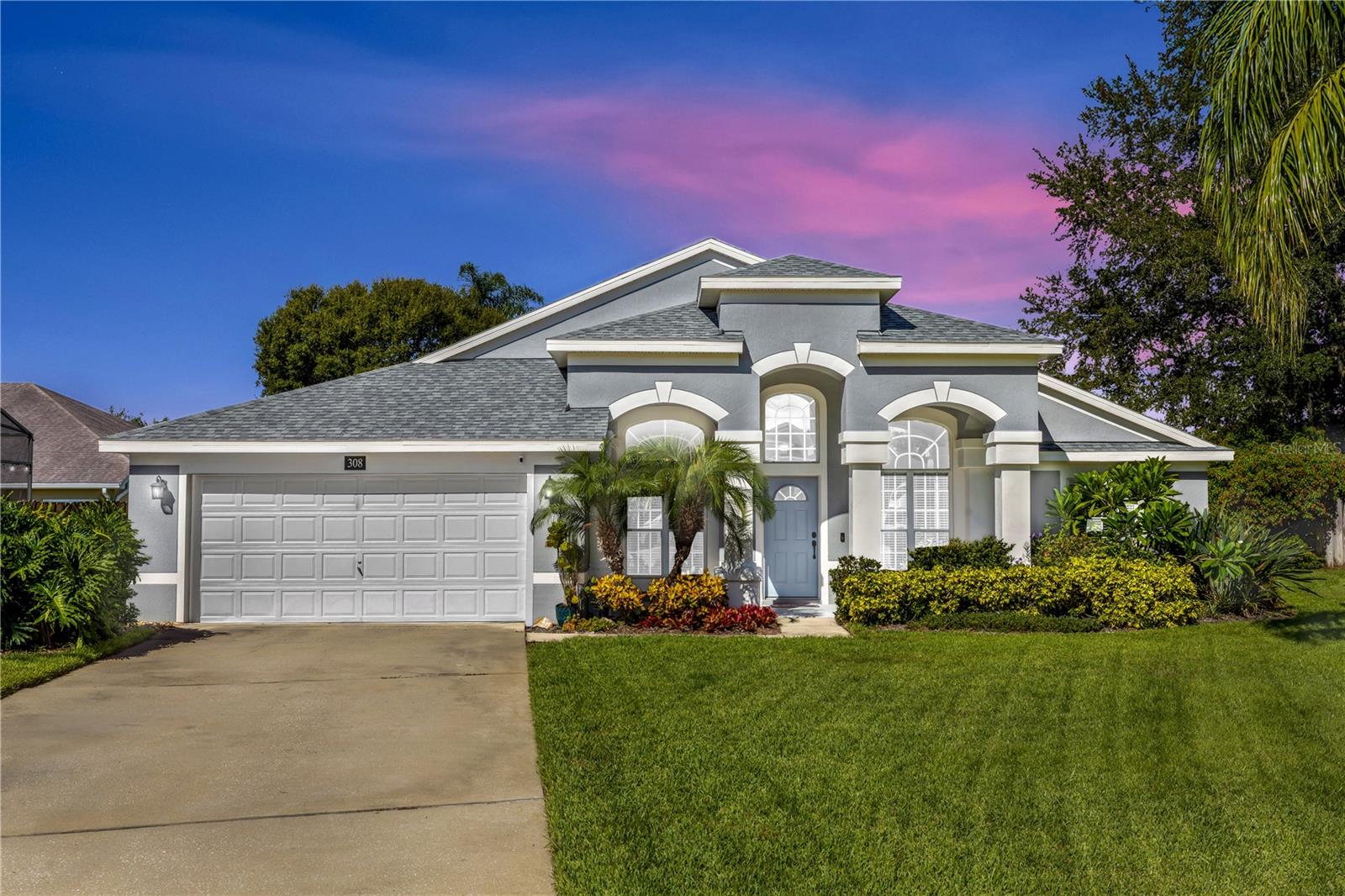 Welcome to this beautifully updated 4-bedroom home with an additional flex room—perfect for a home office—tucked away in the sought-after Reserve community in DeBary, complete with a sparkling community pool. Situated on a quiet cul-de-sac with a long driveway, this property blends modern upgrades with timeless charm. Step inside to find tile wood-look flooring, soaring vaulted ceilings, and abundant natural light. The remodeled kitchen is a showstopper, featuring granite countertops, a farmhouse sink, white cabinetry with soft-close drawers, and black appliances. The formal dining room and open layout make entertaining a breeze. The spacious primary suite is a true retreat, boasting a completely remodeled en suite with a double granite vanity, garden tub, separate shower, huge walk-in closet, and private sliders leading to the screened patio. Additional bedrooms offer comfort with plush carpet (except one with tile), and the versatile flex room provides endless possibilities. Outdoor living shines with a large screened patio with vaulted ceiling, extended paver patio with built-in fireplace, and prepped space for a summer kitchen—perfect for year-round gatherings. Other highlights include: Roof 2017, Water heater 2016, HVAC 2015, and washer/dryer included. Enjoy the quiet setting with all the perks of community living in a prime DeBary location with a COMMUNITY POOL & close to shopping, dining, and recreation. Schedule your private showing today! This home may be under audio and visual surveillance.