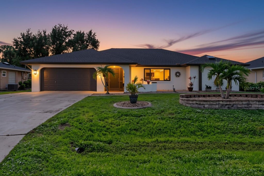 Photo of 21443 Sheldon Avenue, Port Charlotte, FL 33952 (MLS # C7532028)