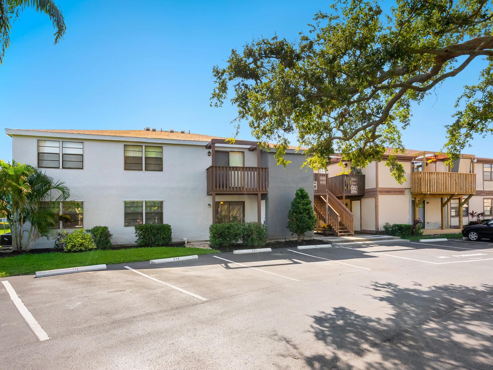 Welcome Home to This Move-In Ready First-Floor condominium. This charming and functional condo offers a thoughtful layout and modern updates throughout. Featuring ceramic tile flooring throughout —no carpet, a new A/C system, and a private outdoor storage room, this residence is ideal for comfort and convenience. The primary suite includes a walk-in closet and a private en suite bath, while the recently renovated kitchen boasts new appliances, butcher block countertops, open shelving, all-new cabinetry with added drawer space, and a deep sink perfect for everyday use. With two bedrooms on one side and a flex space/third bedroom or home office on the other, this layout offers versatility. The indoor utility room houses a washer, dryer, and extra shelving for storage. Lakeview is a quaint, well-maintained community with a private pool and low monthly fees that cover cable, internet, exterior maintenance, and insurance. Ideally located near dining, entertainment, shopping, and just minutes to our world-famous Gulf beaches—this is Florida living at its best!