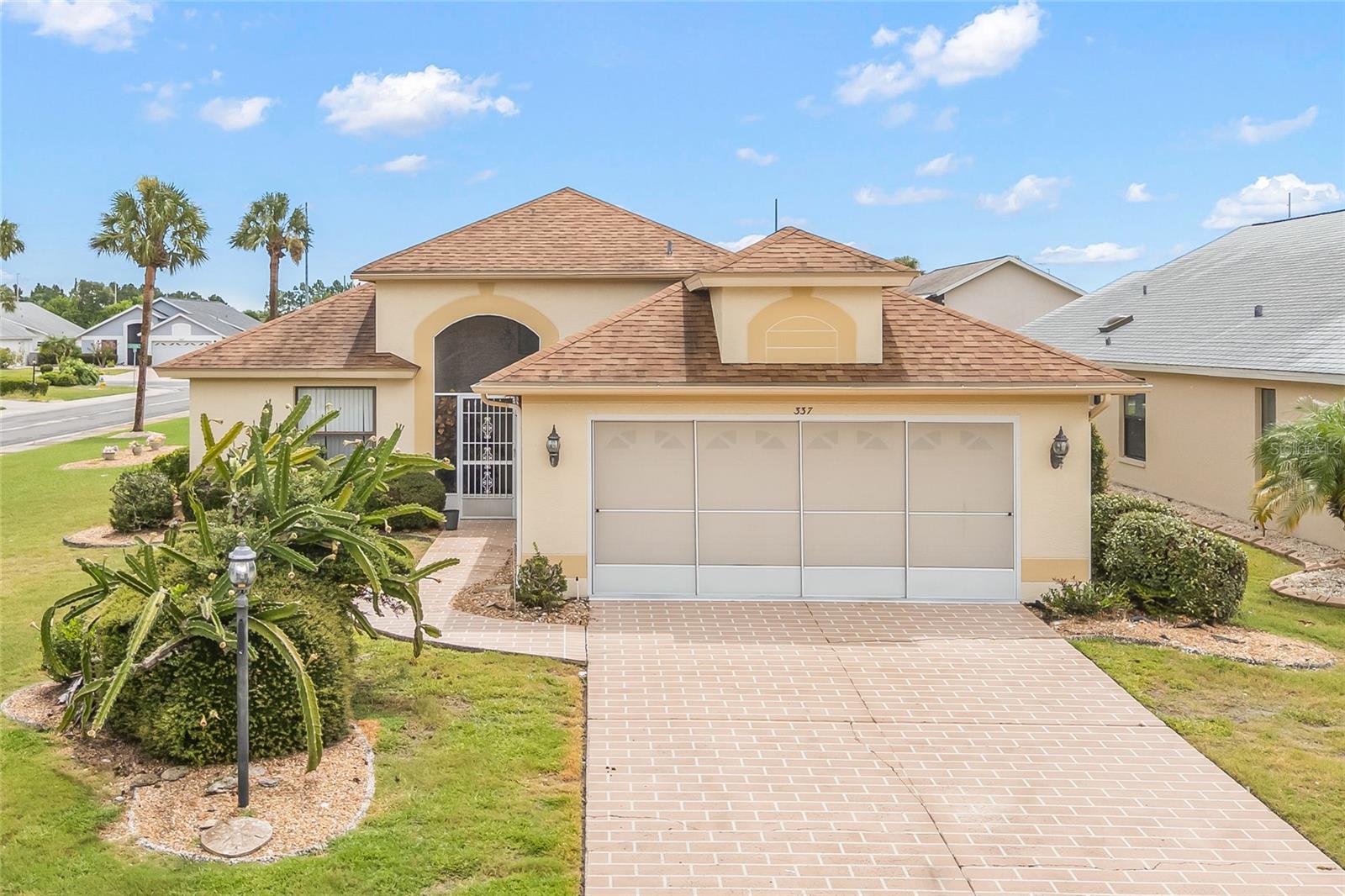 One or more photo(s) has been virtually staged. **Sun City Center, FLORIDA: The Place to Be!**
Discover this Premium CORNER lot single-family block home featuring 2 bedrooms and 2 bathrooms, and a very large 2 car garage. With a Low HOA fee and NO Flood zone concerns, this property offers a huge lot, an enormous Florida room, and a large screened-in patio. Key updates include a ROOF installed in 2014, a WATER HEATER in 2023, and HVAC system in 2020. The garage is spacious and comes with a screen to keep bugs out while you tinker! Both the exterior and interior have been freshly painted. A four-point inspection was completed in May 2025, and the report is clean, and the seller is happy to share it with interested buyers. This property remained high and dry during last year’s hurricanes. Sun City is renowned as one of the best 55+ communities in Florida, with lawn care included in the HOA fee. Residents can enjoy a variety of activities through more than 200 clubs, including dance, painting, pottery, woodworking, shuffleboard, lawn bowling, stained glass, pickleball, and knitting. There are also exercise classes, indoor and outdoor pools, water aerobics, a state-of-the-art fitness center, and various volunteer opportunities. Conveniently located, you can drive a golf cart to grocery stores, shopping centers, Home Depot, restaurants, doctors' offices, and more. Sun City Center is close to beautiful beaches, theme parks, sporting events, and less than a 30-minute drive to Tampa and Sarasota International Airports. Additionally, it's only 30 minutes to MacDill Air Force Base and Downtown Tampa. Make this your new home and experience the incredible lifestyle that this vibrant active adult neighborhood has to share.