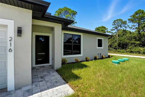 Photo of 216 Ogden Avenue S, Lehigh Acres, FL 33974 (MLS # O6347157)